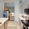 a kitchen with white cabinets