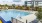 a swimming pool with a fence around it