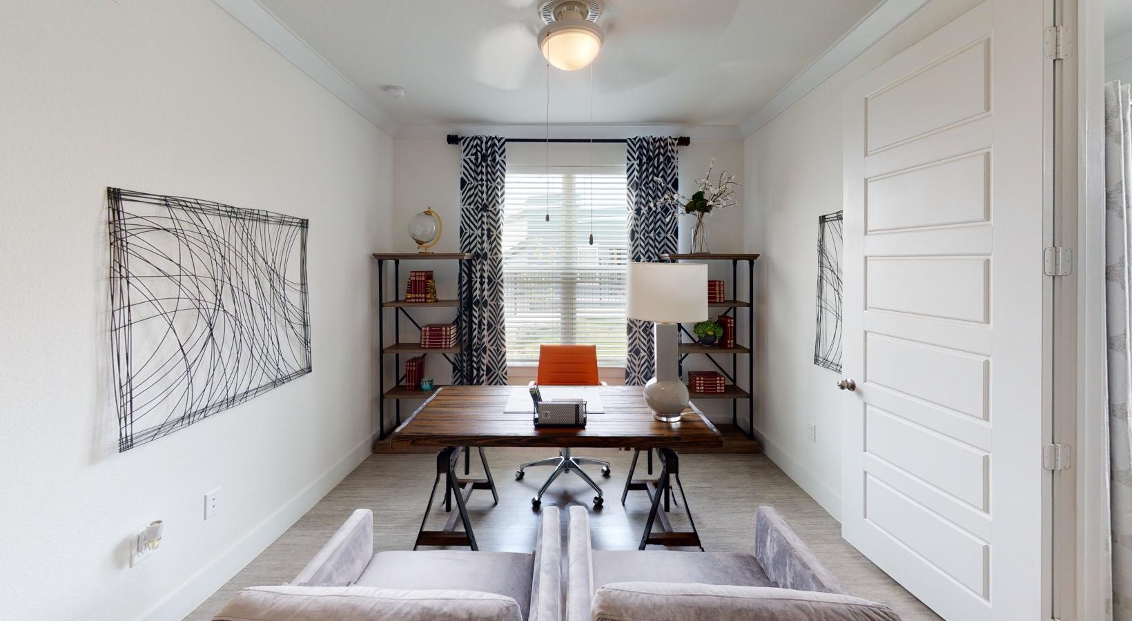 Wide open living areas perfect for entertaining a living room with a table and a couch