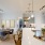 a kitchen with a dining table and chairs