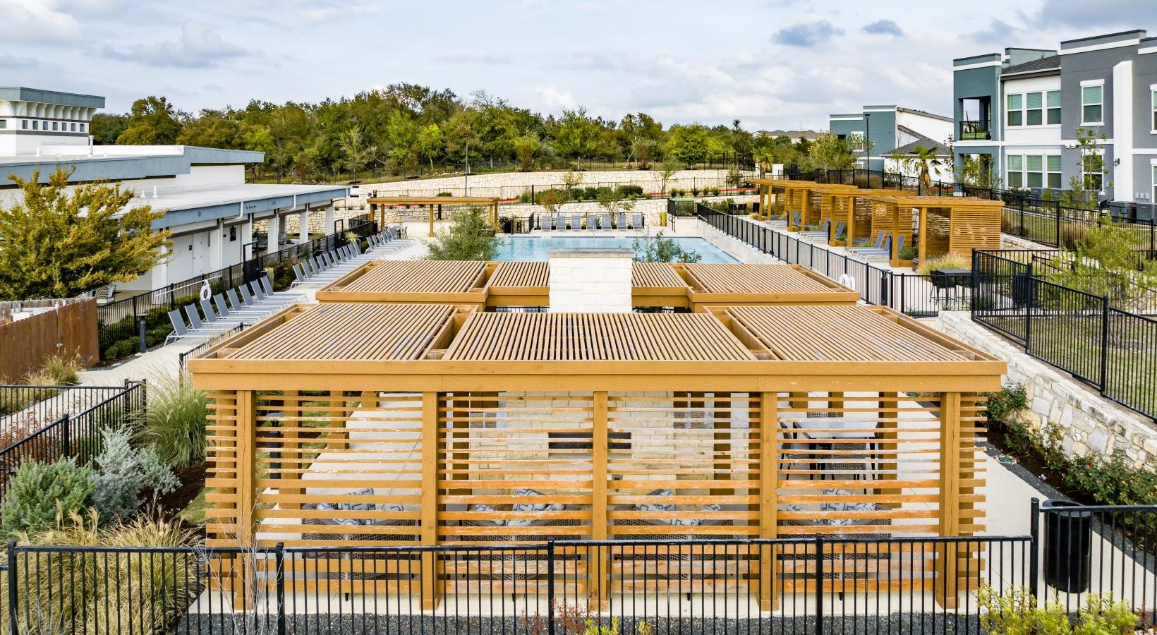 Settle into comfort at Reveal 54 a building with solar panels