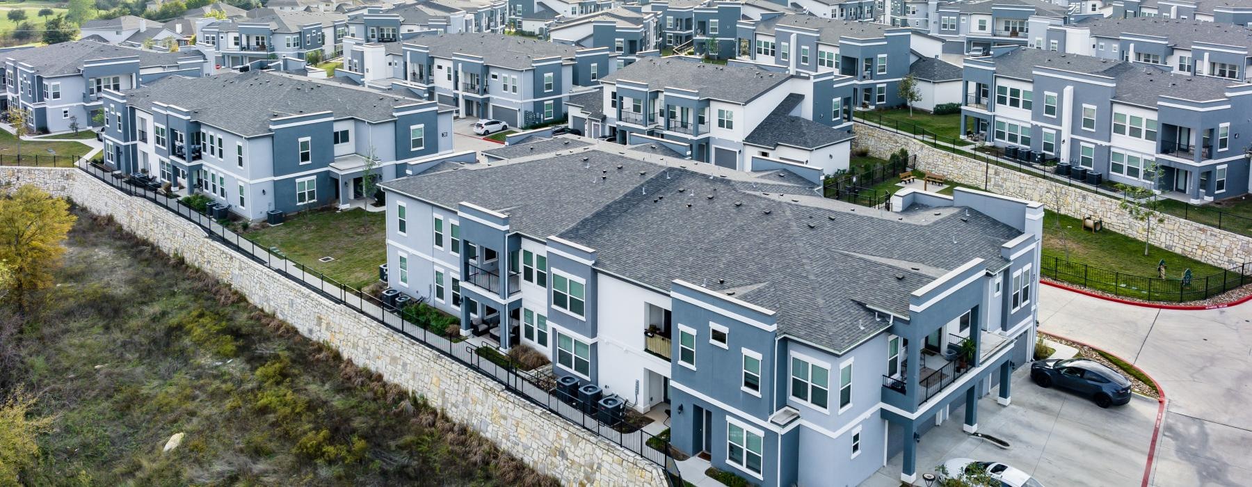 a group of buildings on a hill