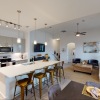 kitchen with an island and a living area