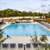 swimming pool with a building next to it