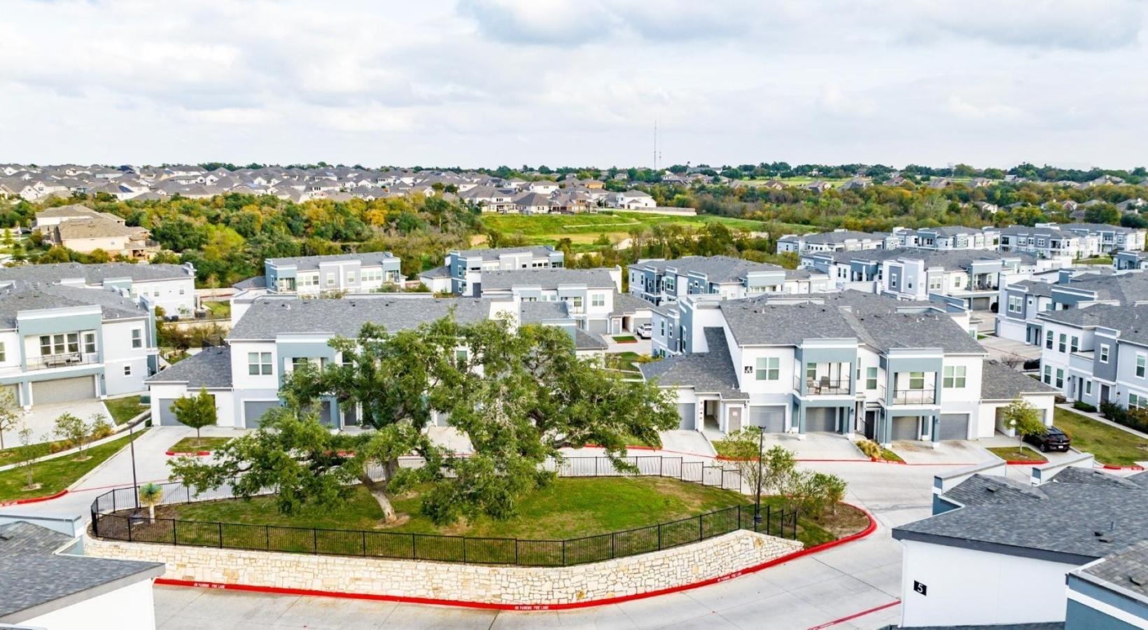 Settle into comfort at Reveal 54 a group of houses