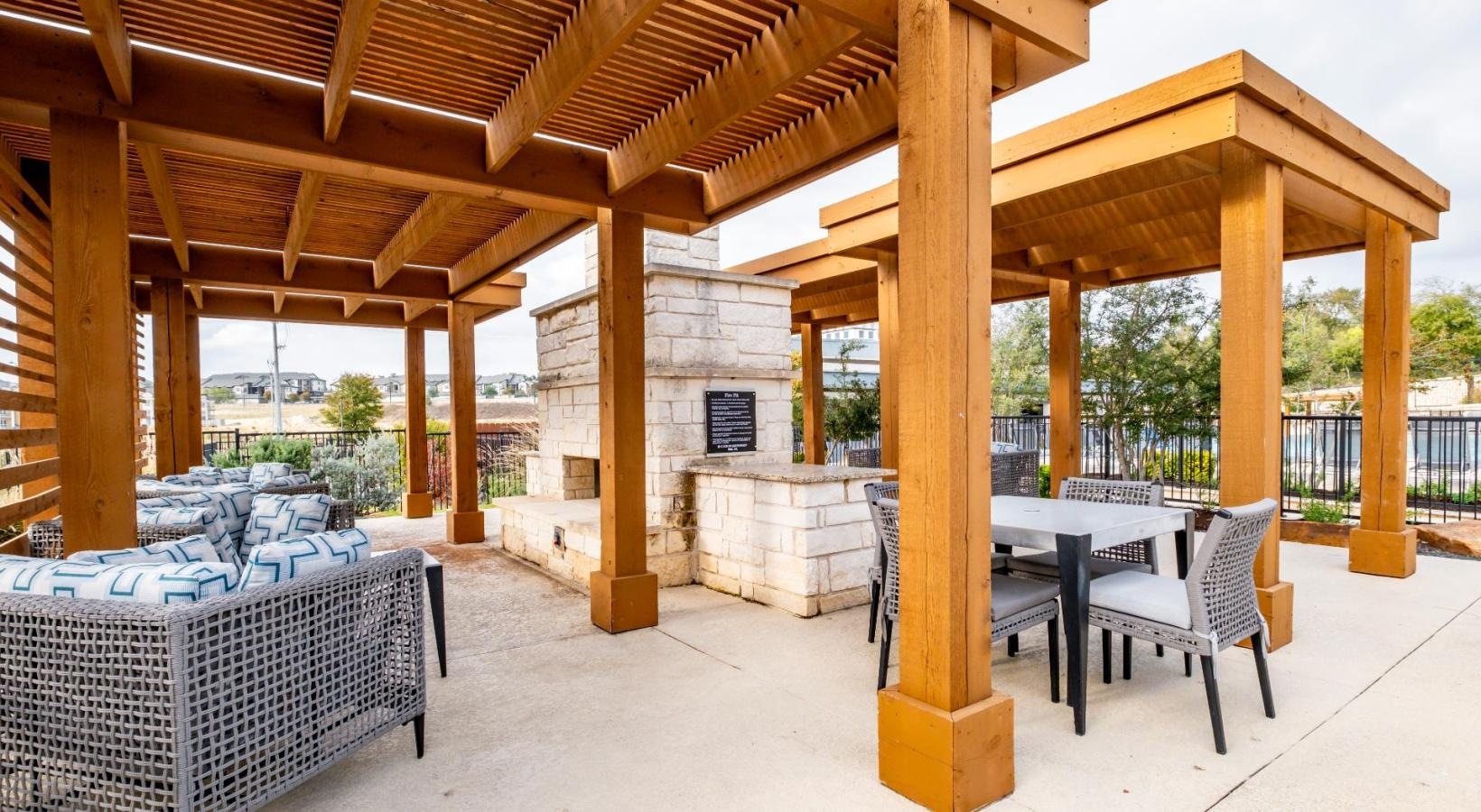 The essence of exceptional living a patio with a table and chairs