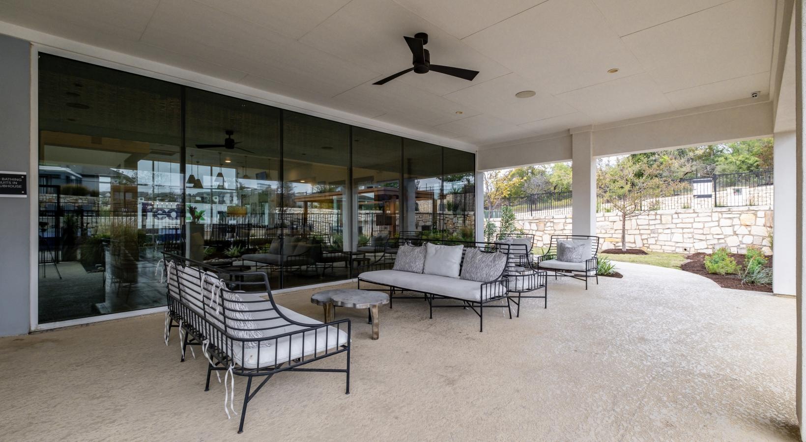 The essence of exceptional living a room with a large glass wall and a white couch and a table