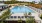 a swimming pool with a fence around it