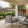 a patio with chairs and a table