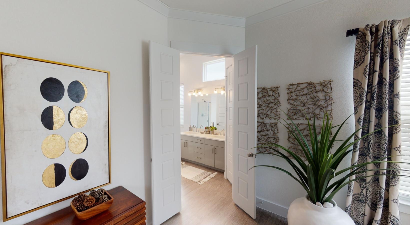 Gorgeous living areas to entertain and enjoy a room with a plant and a table