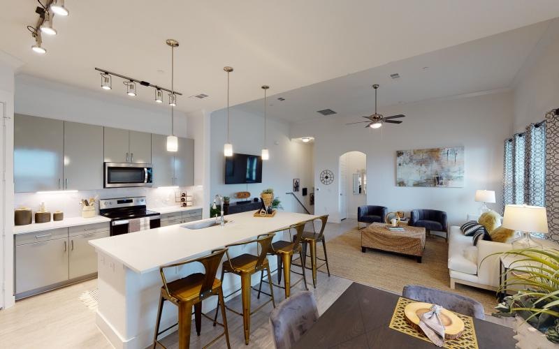 a kitchen and living room
