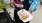 a person holding a plate of food