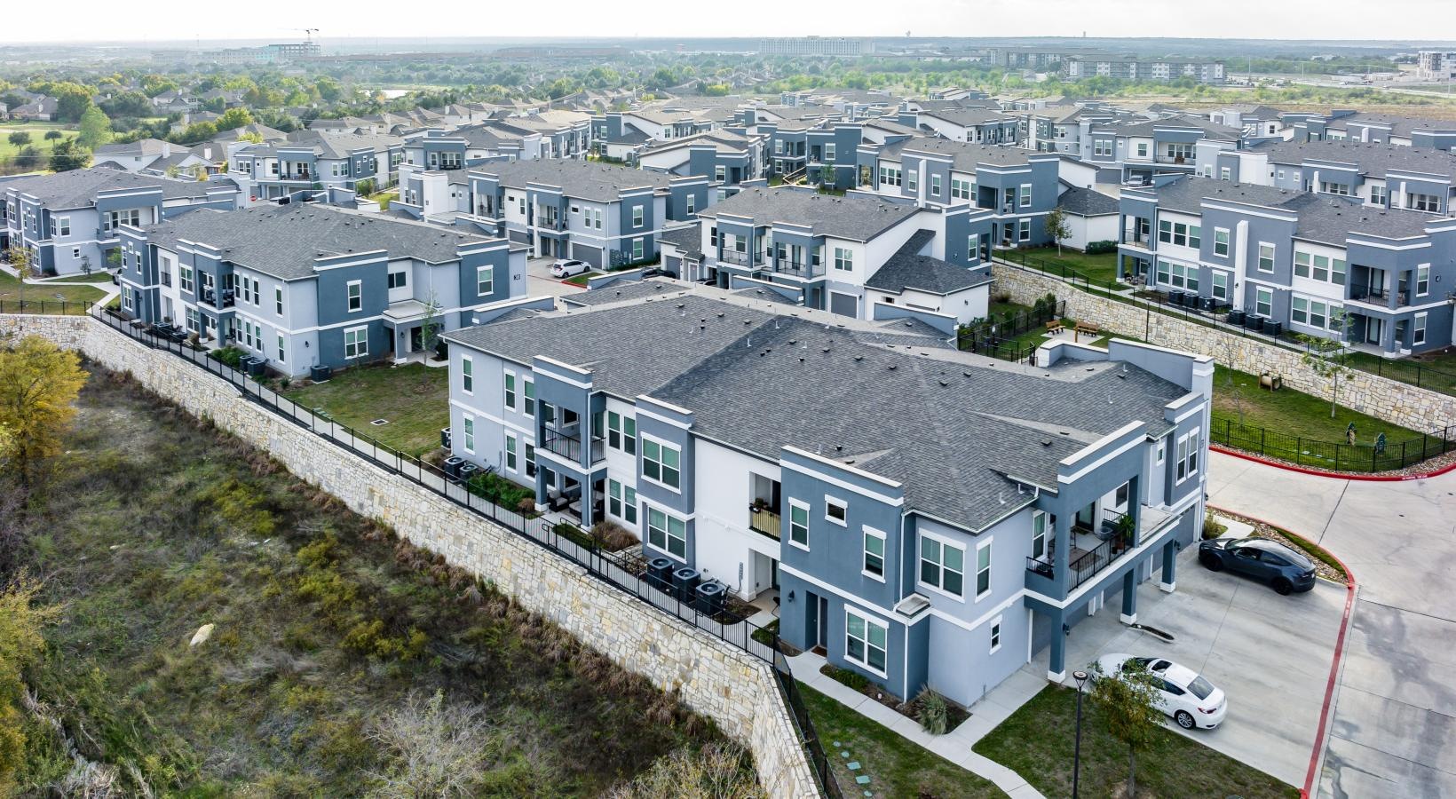Find your perfect fit at Reveal 54 a group of houses on a hill