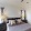 a bedroom with a bed and lamps