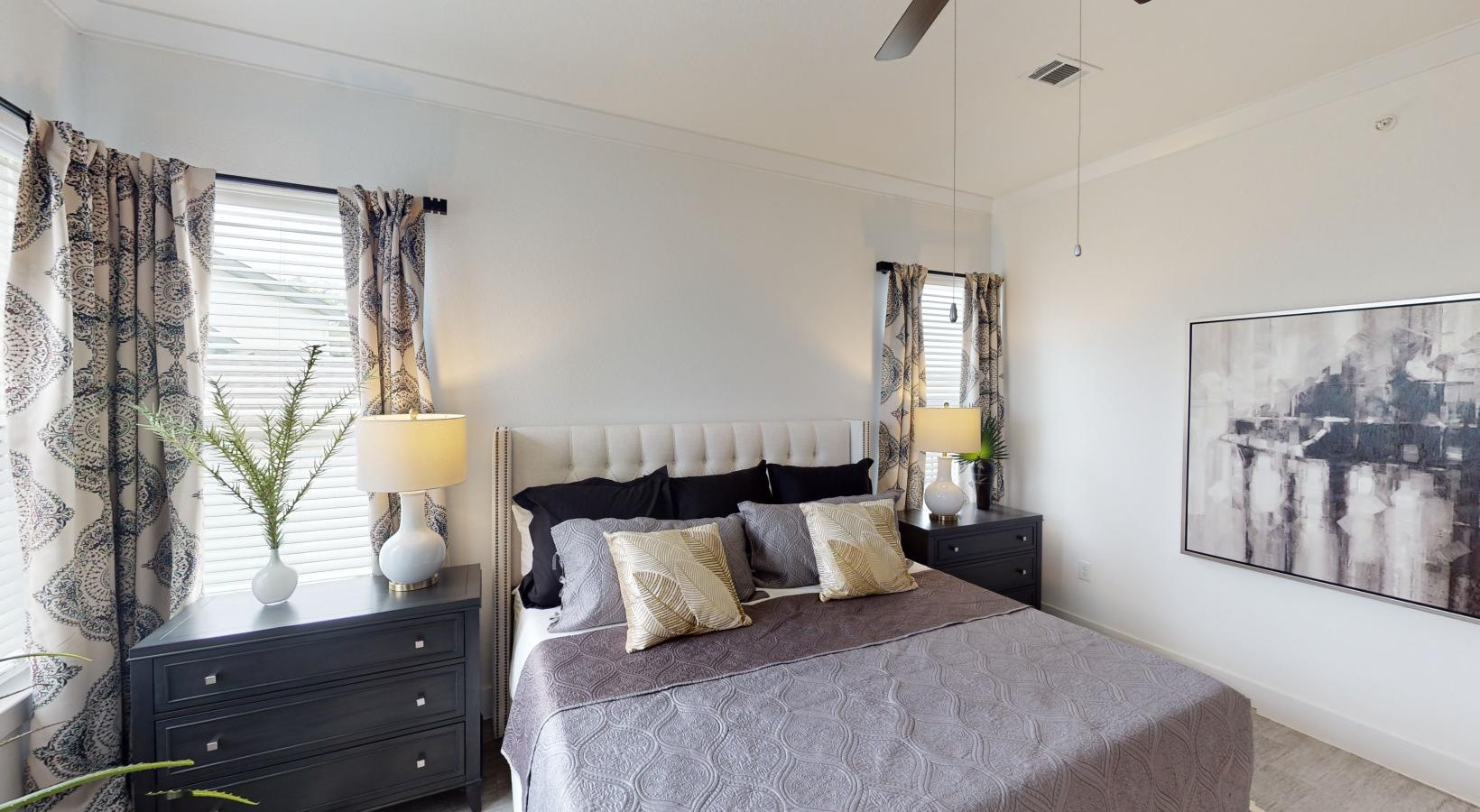 Bedroom options to fit every lifestyle a bedroom with a bed and lamps