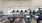 a room with exercise equipment and chairs